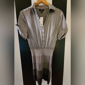 Bebe. Gray Dress. W/price tag. Never worn. Size Small.